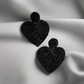 Sassy black beaded heart earring